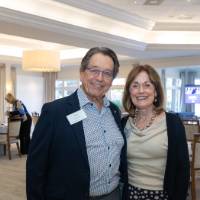 Jim and Donna Brooks standing together and smiling for photo